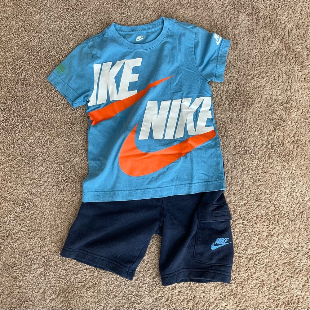 Nike Light Blue and Orange Tee with Dark Blue Shorts